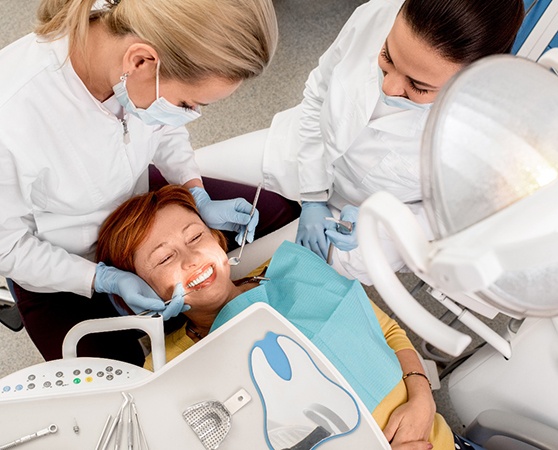 Woman visiting a dentist in Cherry Hill for an exam