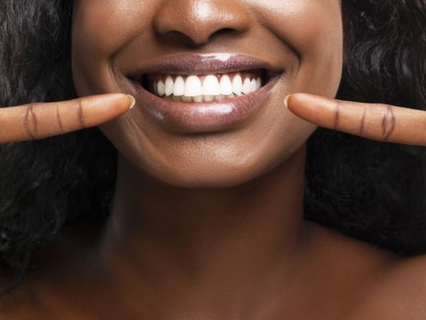 Closeup of healthy smile after periodontal disease treatment